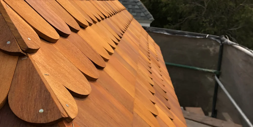 tiled light brown roofing of a house closeup